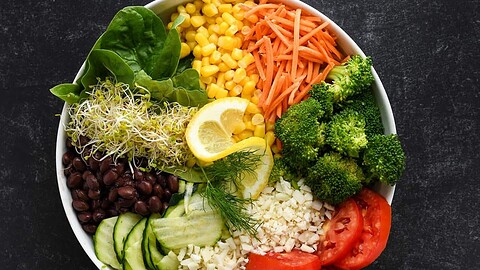 healthy salad bowl with greens